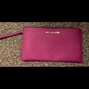 Michael Kors fuchsia clutch
